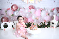 white brick pink balloons